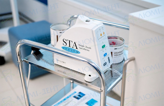 Computer anesthesia STA Dentistry treat teeth without pain not hurt Kiev Lumi-Dent