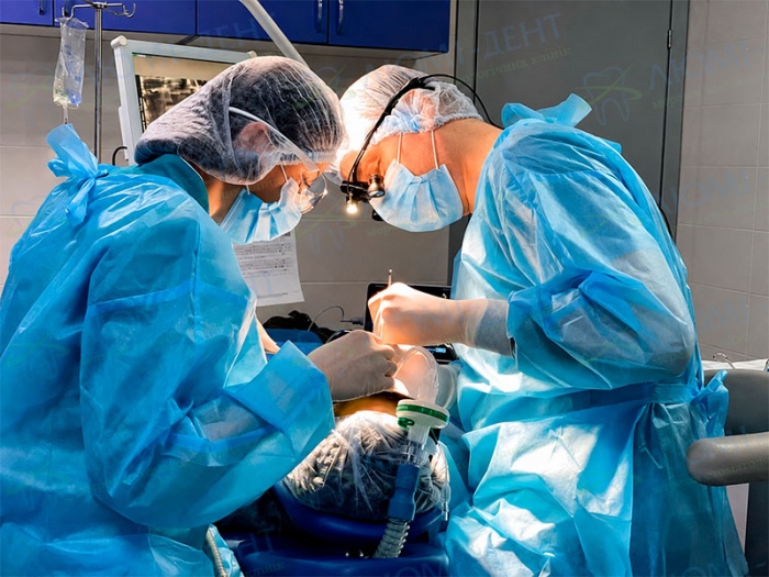 Patient treatment under computer anesthesia at Lumi-Dent Dentistry without pain anesthesia Lumi-Dent